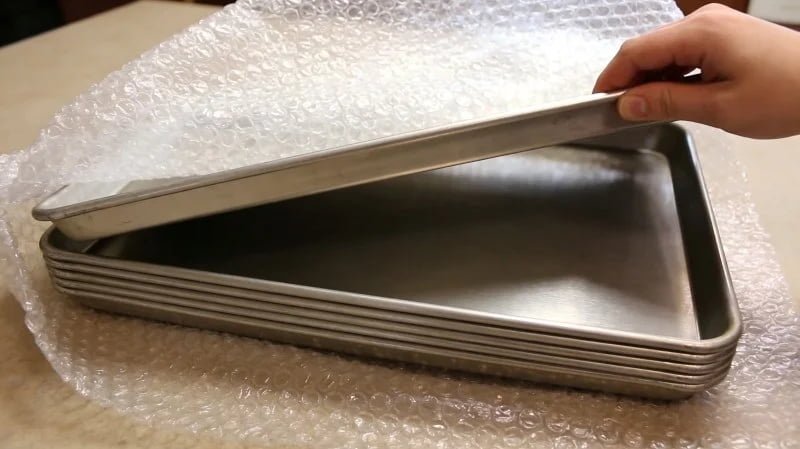 baking tray sample being inspected