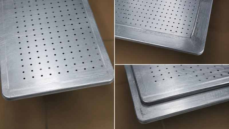A detailed shot showing the reinforced rounded corner of a custom pan